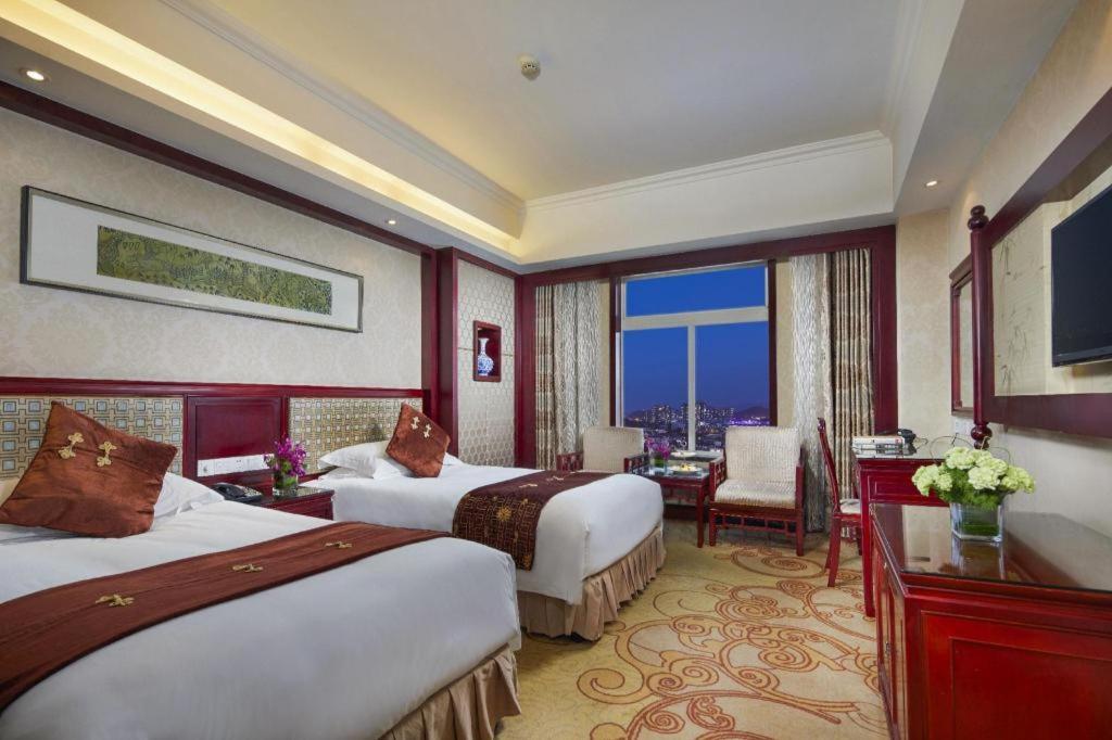 Feicheng Blossom Hotel Exterior foto